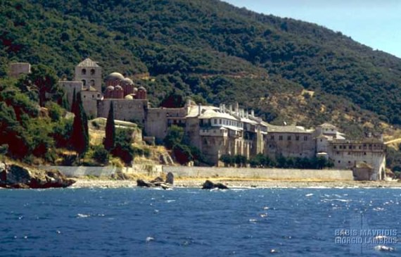 A view of the monastery from the sea.The domes of the newer, primary churches are clearly visible