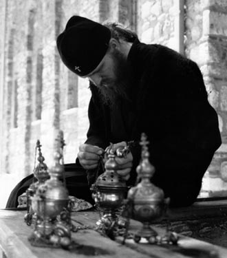 Cleaning the censers, Visoki Decani Monastery monk, Serbia