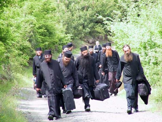 Pilgrimage of serb monks from Raska and Prizren Monasteries in Serbia, to central Serbia and Belgrade, up the hill to the bus at Koncul