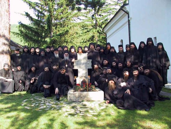 Serb monks around the tomb of St. Justin of Celije, Serbia