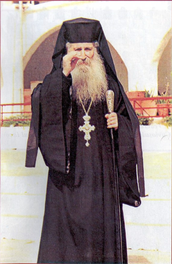 Abbot Jacov in the monastery yard, giving his blessing