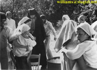 During the baptismal procession at the old Saints Adrian and Natalie church in Etna, 1981 - Copyright  The Blessed Seraphim Hermitage