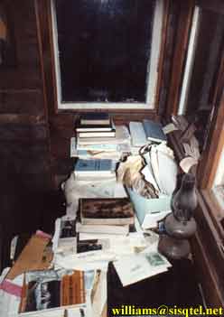 Blessed Seraphim's desk with books and a kerosene lamp - Copyright  The Blessed Seraphim Hermitage