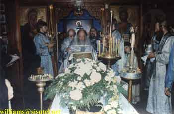 Ordination of Reader Lawrence to the Sub-Diaconate, at Blessed Seraphim's Funeral Liturgy. Blessed Seraphim's coffin is in the foreground (1) - Copyright  The Blessed Seraphim Hermitage