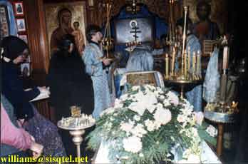 Ordination of Reader Lawrence to the Sub-Diaconate, at Blessed Seraphim's Funeral Liturgy. Blessed Seraphim's coffin is in the foreground (2) - Copyright  The Blessed Seraphim Hermitage