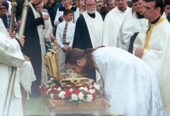 14. Vigil - Antiochian priest John Mack venerates the relics of St. Raphael at the Vigil service