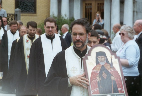 3. Vigil - Leading the procession that brought all the clergy, the relics and the hierarchs into the area where the Vigil would be conducted was an Antiochian priest, Rev. Fr. Paul Alberts of Toledo. Fr. Paul had brought this icon with him to the glorification to be blessed at the Liturgy before the glorification. Not shown here, at the base of the icon is a star-shaped reliquary containing a relic of our holy father Raphael