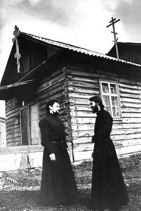 Two russian monks talking