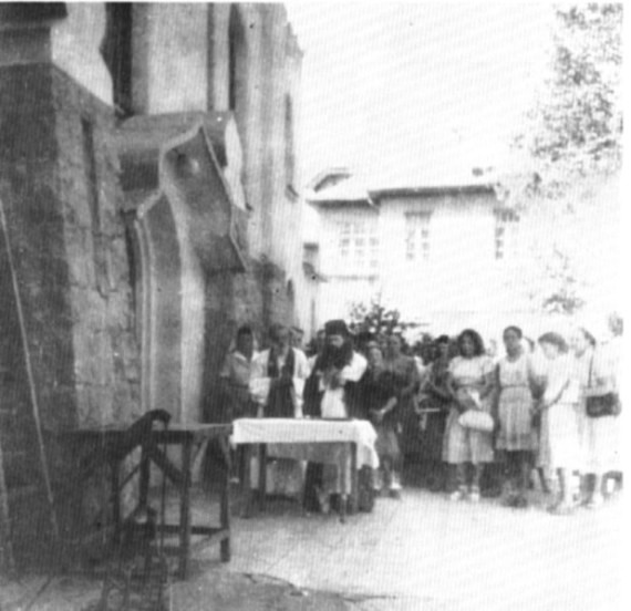 Bishop John serving with Fr. David Chevchenko, August 30, 1948, Sindao, China. When the Soviet administration ordered the church to be locked, Bishop John did not hesitate to serve Liturgy in front of the church. In this particular picture he is serving a molieben