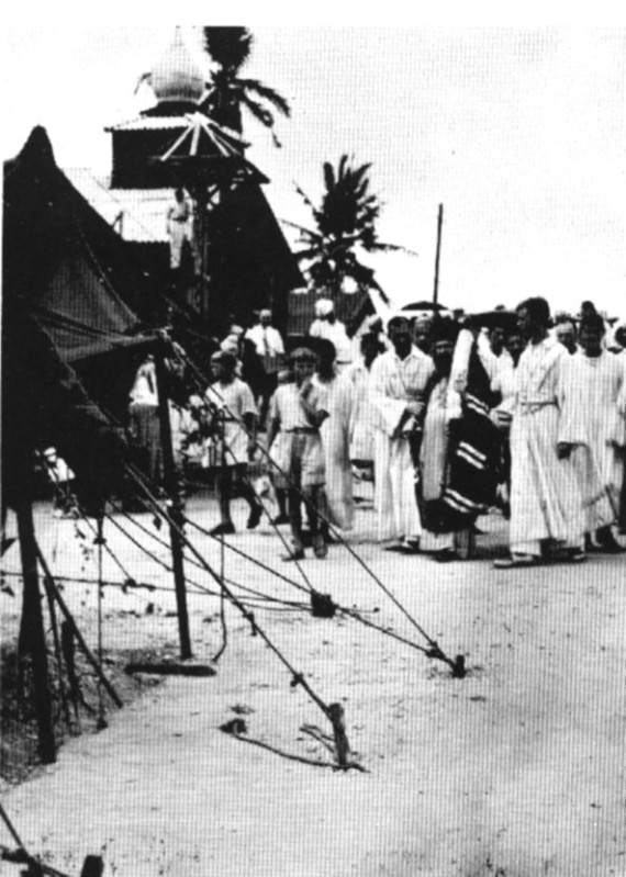 Refuge camp in Tubabao, Philippines. In the background is the camp church