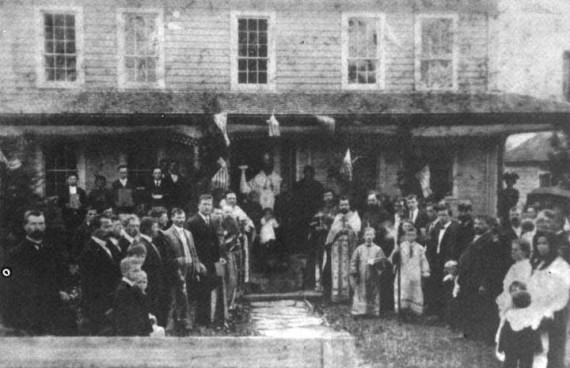 St. Raphael, as bishop, at the center, in the white, at the dedication of St. Tikhon's Orphanage and Monastery