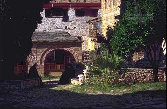 An interior view of the monastery. Within the calmness of Agios Oros, the discussions are about the recent problems in society
