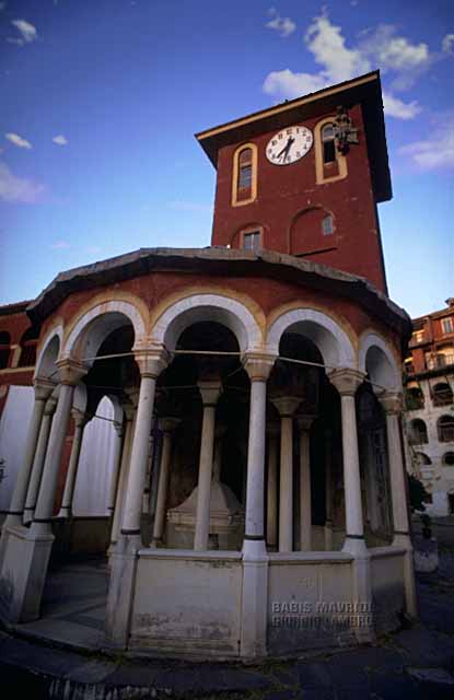 Outside of the front part of the main church, the bottle with the holy water is found