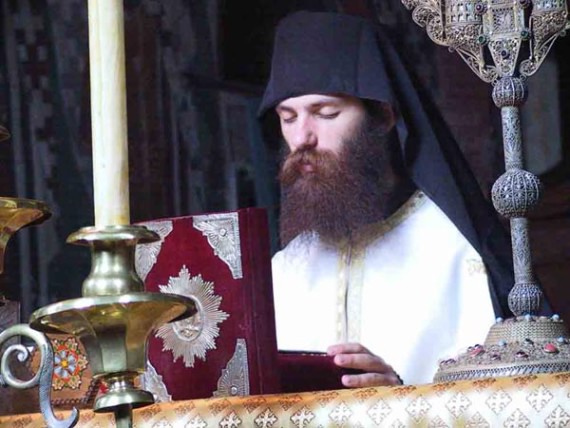 A priestmonk in prayer