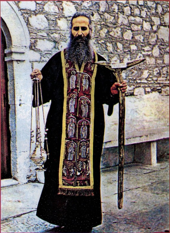 Waring the epitrachelion of Blessed David, also holding his censer and his praying stick (1976)