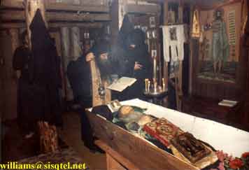 Visiting clergy, Frs. Chrysostomos and Auxentios, serve a Panihkida for Blessed Seraphim. September 1982 - Copyright  The Blessed Seraphim Hermitage