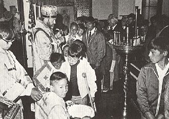 30. Bishop Dmitri of Berkeley, holds the Cross for veneration at the end of the Vigil