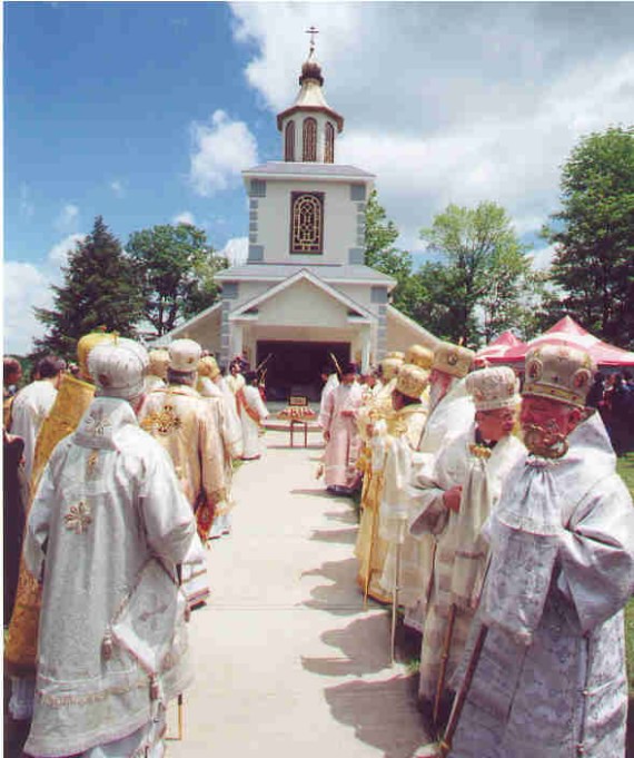 18. Procession and Divine Liturgy - Looking down the row of hierarchs in attendance at the Glorification Liturgy. In the background is the chapel that was used for the Vigil